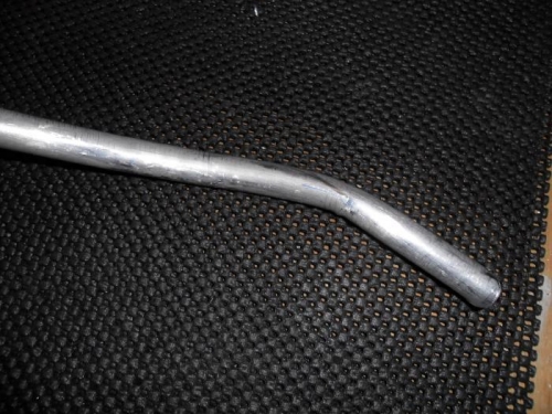 Tube bend to clear engine mount