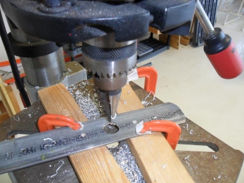 Adding some lightening holes to the battery strap