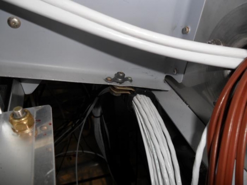 Adel clamps installed to support forward wiring bundle