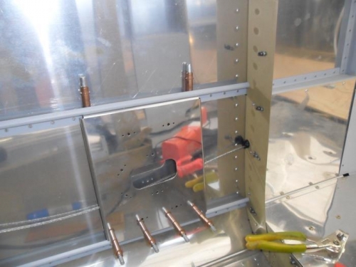 Bracket drilled to structure