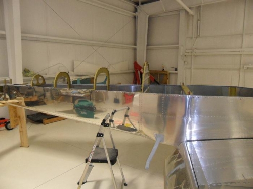 Aft skins are off for deburring and dimpling