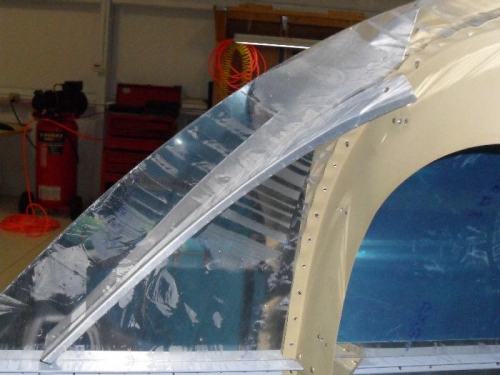 Fitting a stiffener on the top forward skin