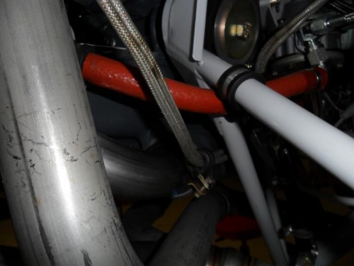 Left side Adel bracket on aft intake tube