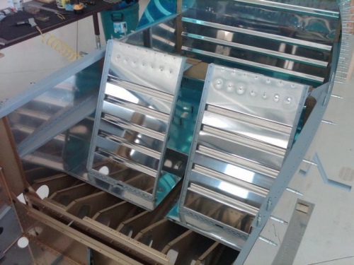 Seat backs installed in fuselage