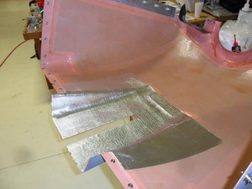 Reflective material applied to lower cowling