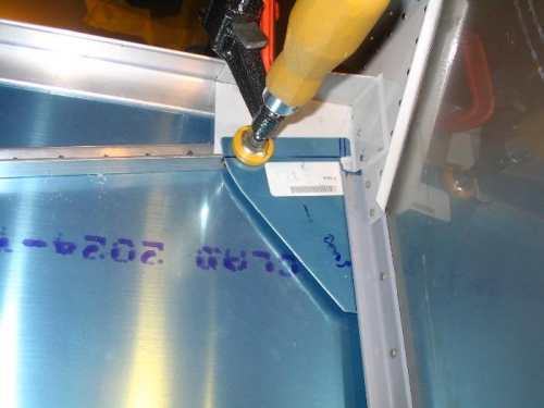 Lower longeron and F-684 gusset clamped in place