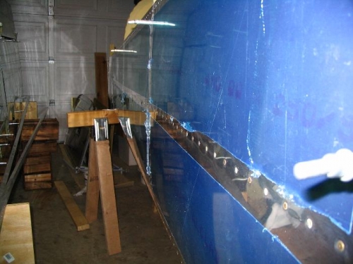 Aft fuselage back on sawhorses with side skins riveted