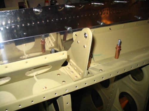 Detail of flap brace, inboard aileron attach bracket, and aileron gap seal