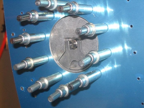 The fuel filler flange clecoed in place after drilling