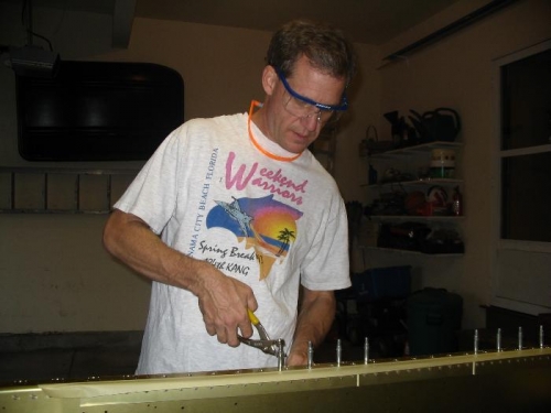 Attaching nutplates for wing inspection panels