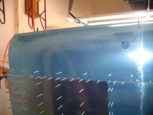 Fuel tank skin in place