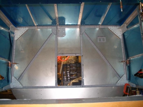 Interior shot of forward fuselage assemblies drilled...floor stiffeners are at the top of the photo