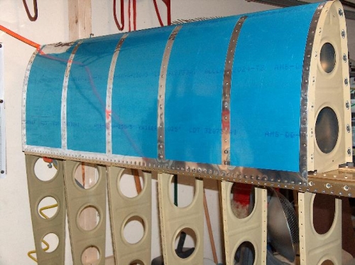 Leading edge riveted in place