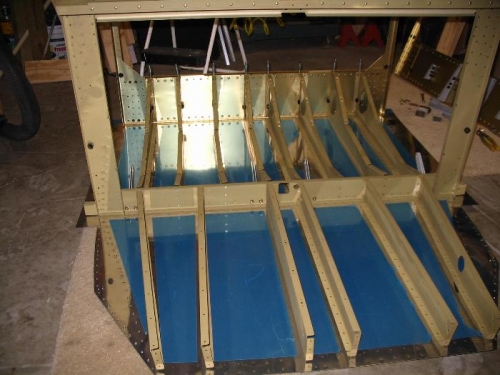 Skin riveted in place