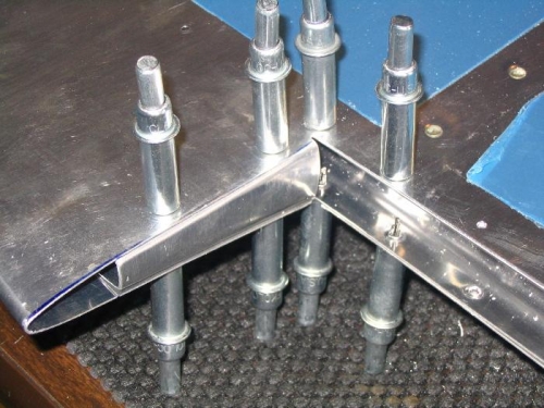 Rib made in place of bending tabs