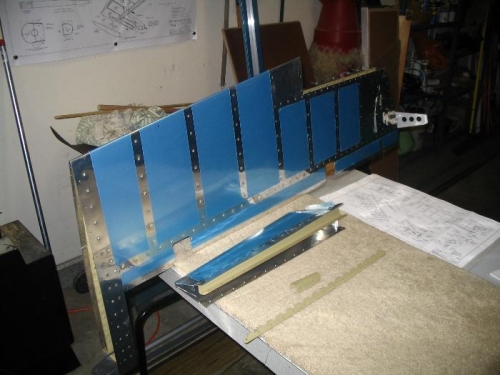 Left elevator with trim tab in front