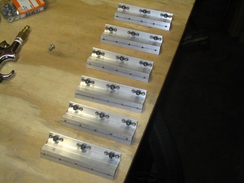 Tank attach brackets with platenuts installed