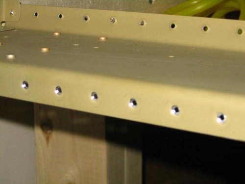 Top of aft spar after touching up dimples with countersink