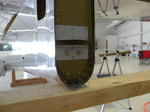 Lower bolts on aft vertical stabilizer spar