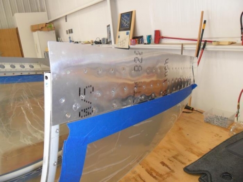 Right side riveted and screwed in place