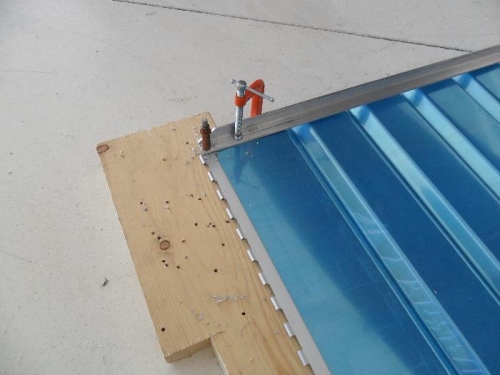 Attaching hinge and angle to seat back