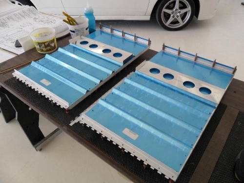 Seat backs drilled and awaiting riveting