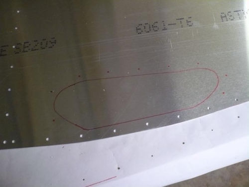 Hole and rivet locations marked