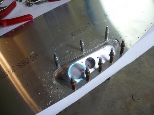 Transfer rivet holes to light fixture