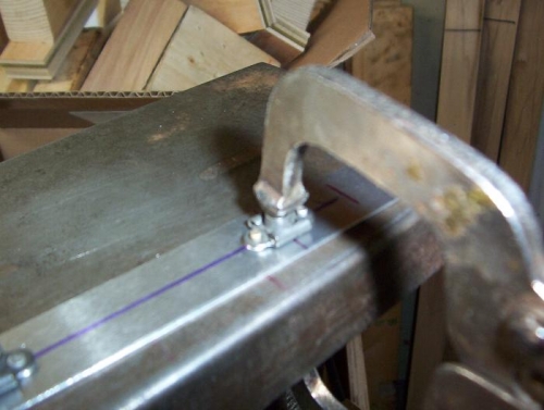 Clamp nut plate down lightly