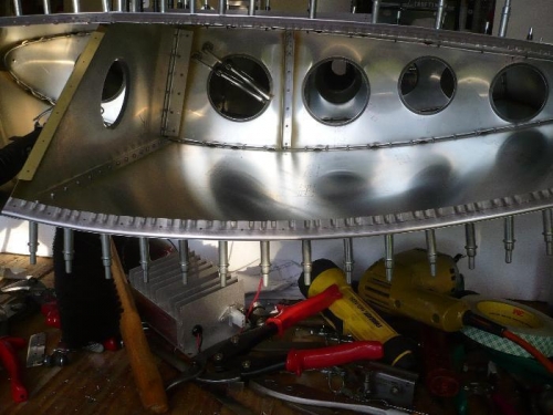 Top of wing is the down side here