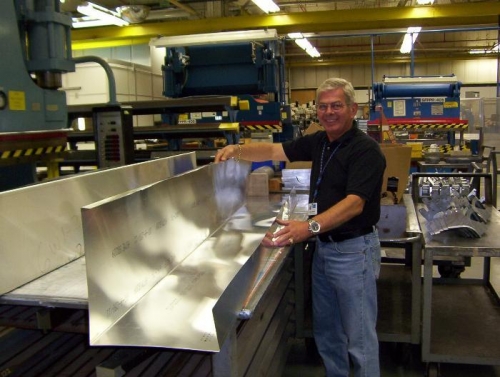 Frank holding bent flap.