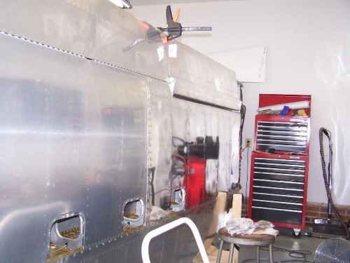 Flap on and hinge pins secured