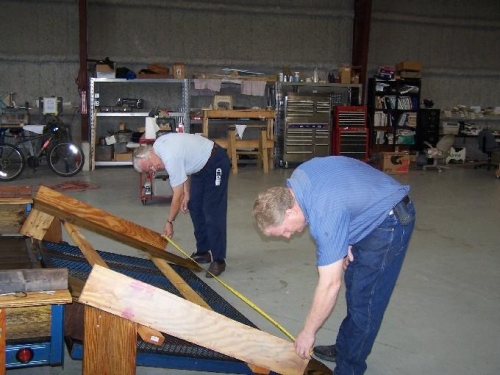 Jeff and Don unloading the plane