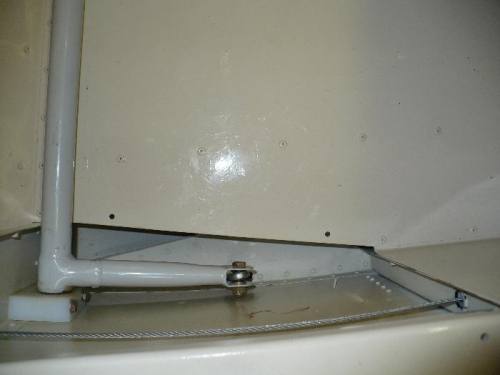 Opened hole for flap connecting rod