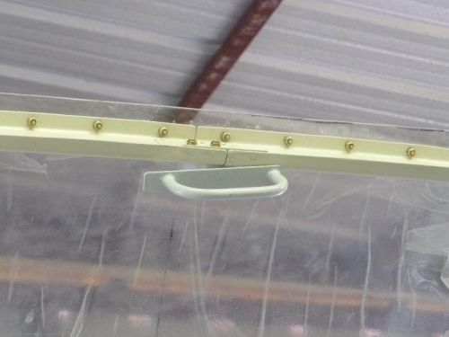 Interior canopy latch