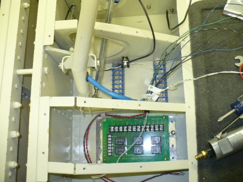 Wiring exits near pivot point