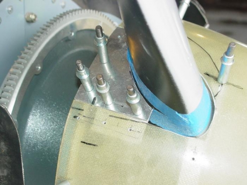 Locating the filler plate on the spinner.