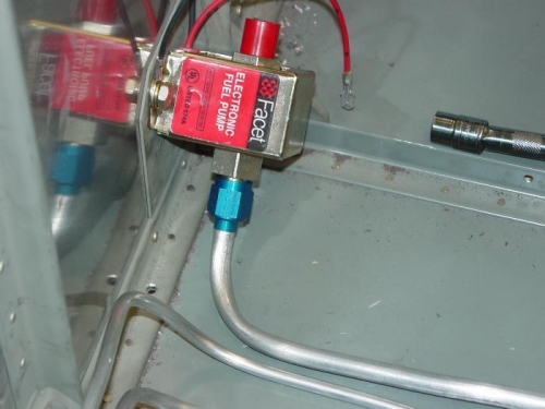 Here is the electric fuel pum with the line running from it to the fuel vslvr.