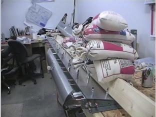 Fitting the top skin and drilling the trailing edge.