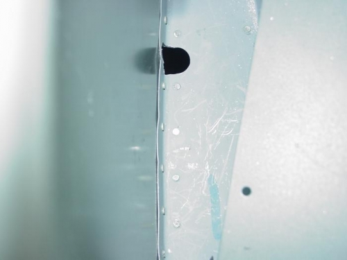 Here is a hole drilled through the bottom of the fuselage.