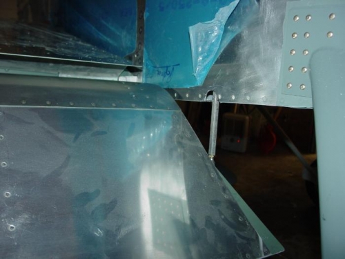 Here you can see the flap bracket coming through the fuselage bolting onto the flap.