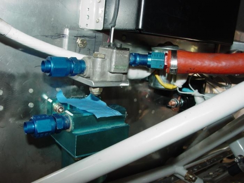 Preparing my gasolater and fuel flow valve for the fuel line.