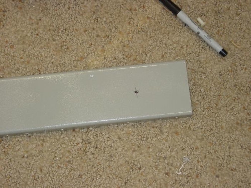 Locating where the map light will go in the center support.