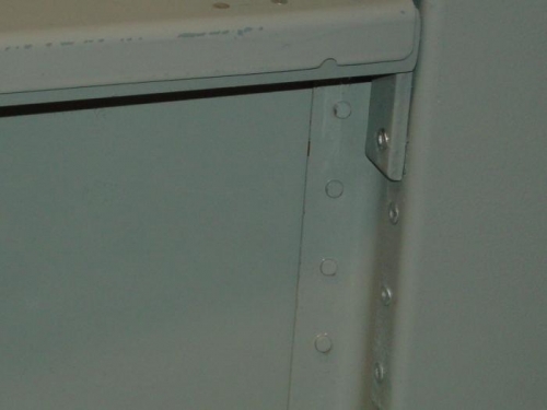 Here is the forward edge of the bracket rivited to the center section.