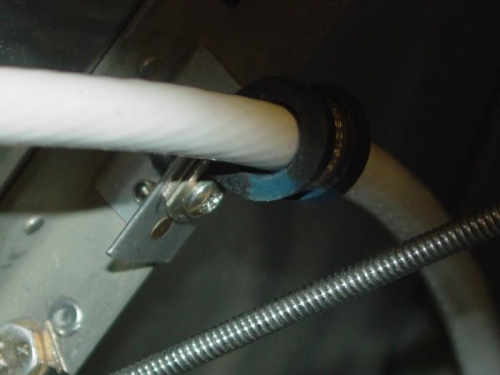 Here is the external power ground mounted to the bracket.