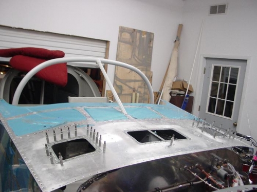 Started riviting the front deck lid.