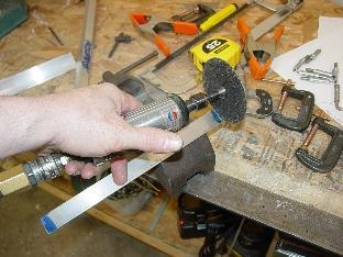 Cutting the stifner for the 708 bulkhead.