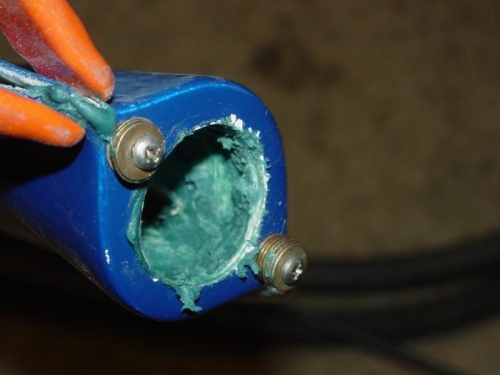 Duraglassing the nuts into the fairing to hold the light in place.