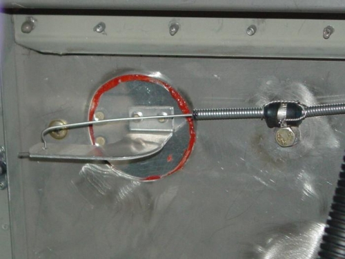 Hooked up the heater cabl;e to the heater door. Need to saftey wire the cable to the door bracket.