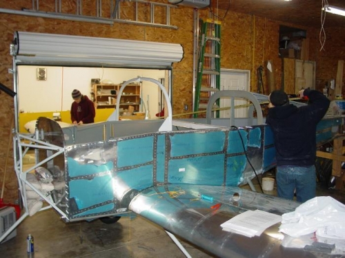 Here Jake and I measure from each wing tip to the fuselage to see if the wings are square.